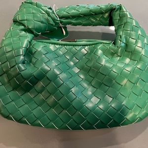 Small green woven cloth purse. New
